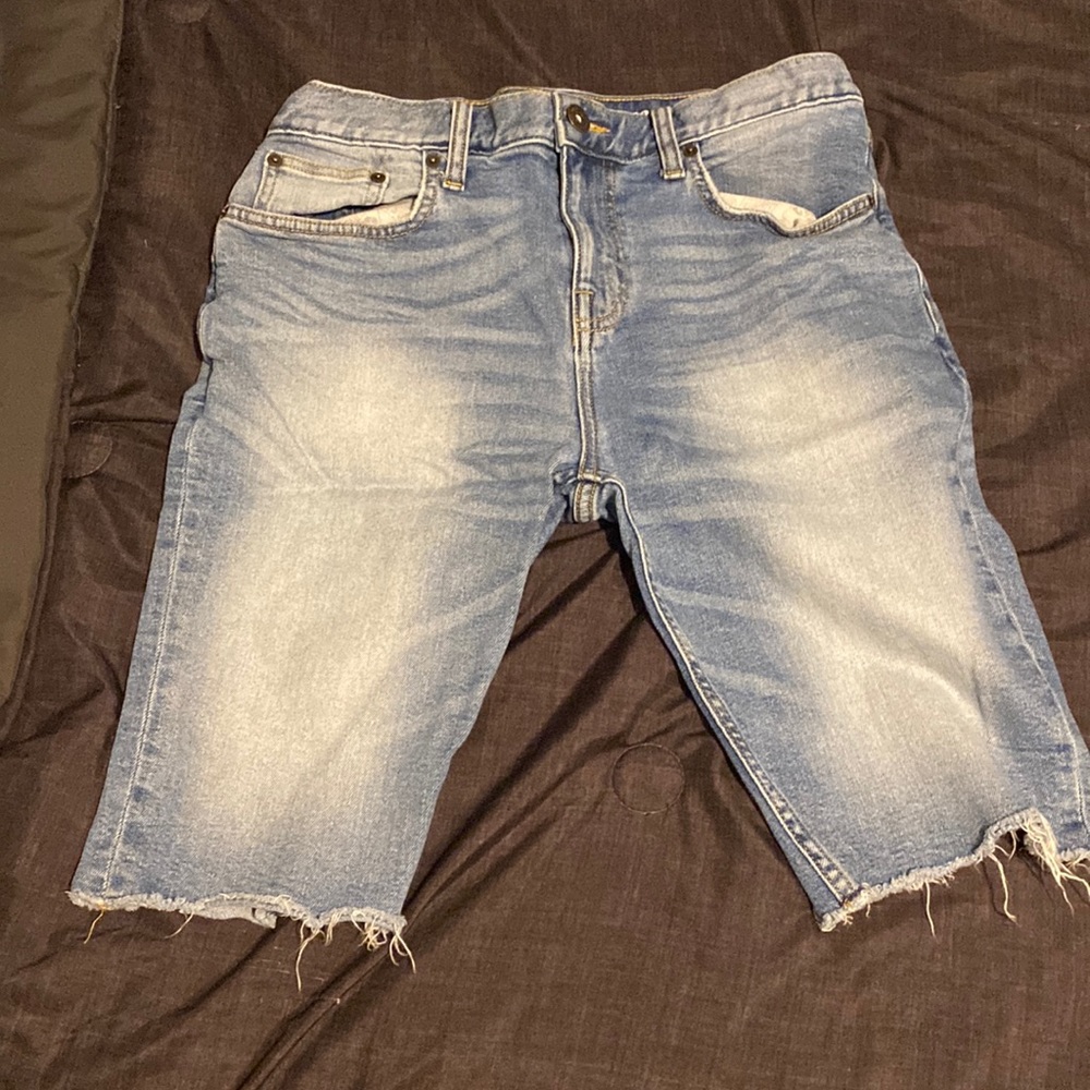 These are jean shorts from Mossimo Supply Co. The size is 32 waist.